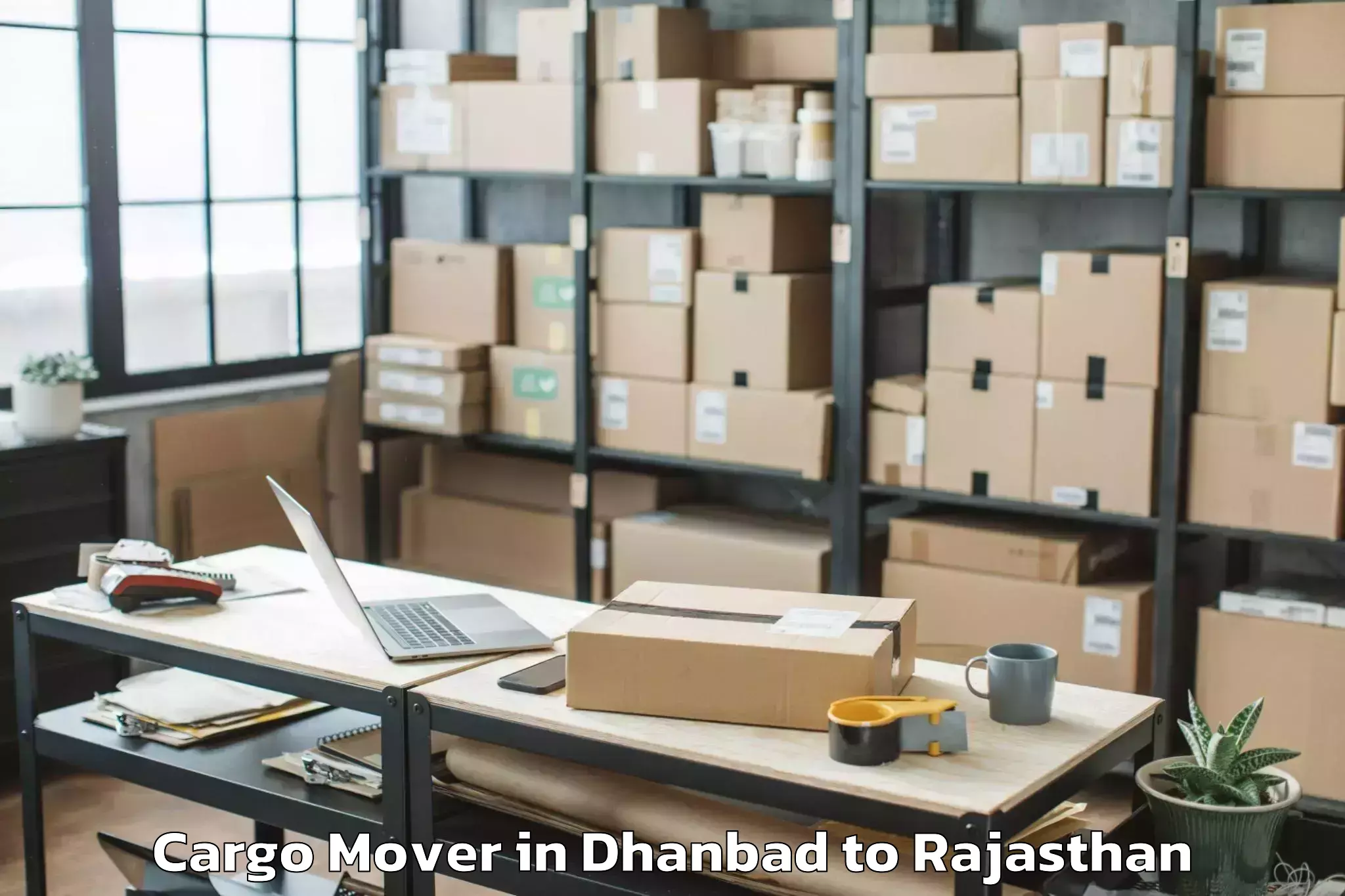 Book Dhanbad to Ladpura Cargo Mover